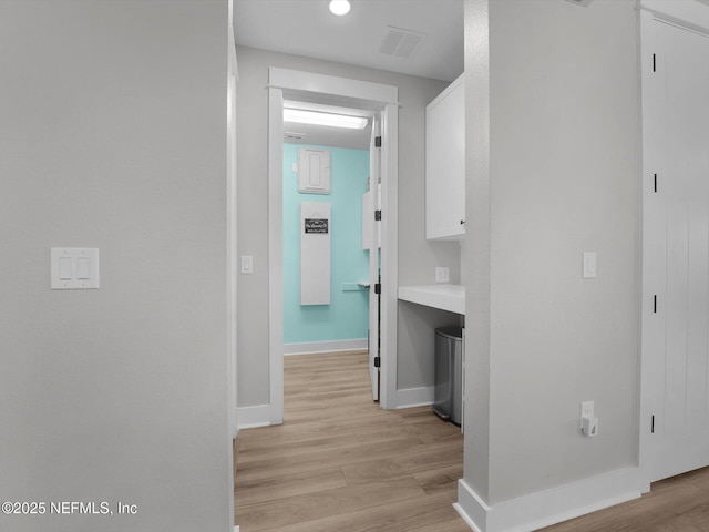 hall featuring light hardwood / wood-style flooring