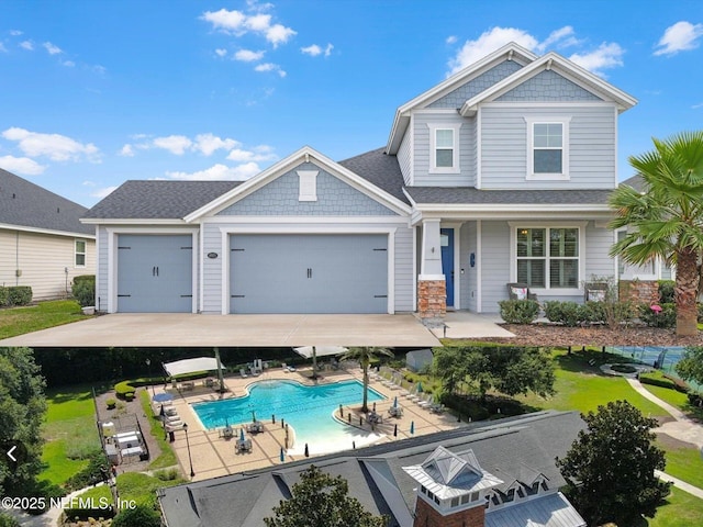 exterior space featuring a garage and a patio