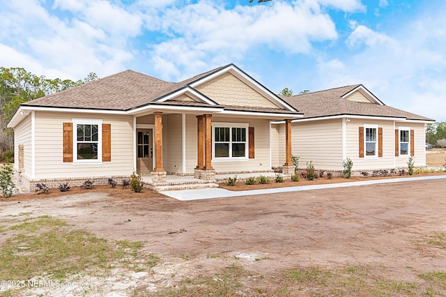 view of front of property featuring covered porch