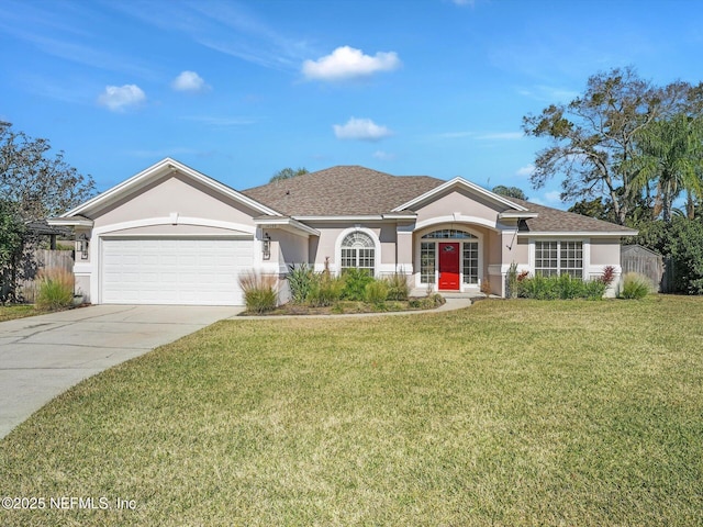 ranch-style house featuring a garage and a front lawn