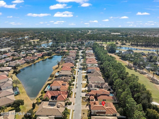 bird's eye view with a water view and a residential view