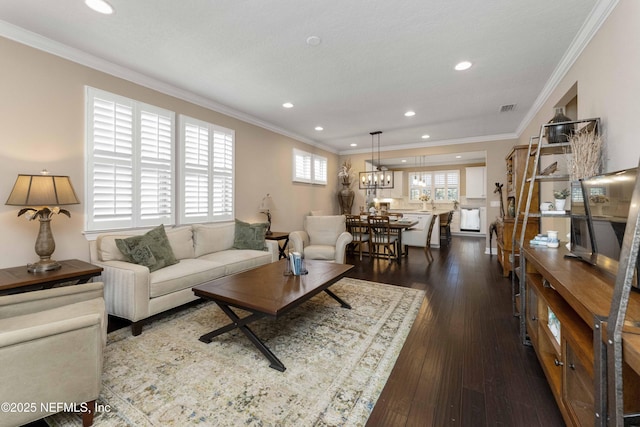 living room featuring crown molding and dark hardwood / wood-style flooring