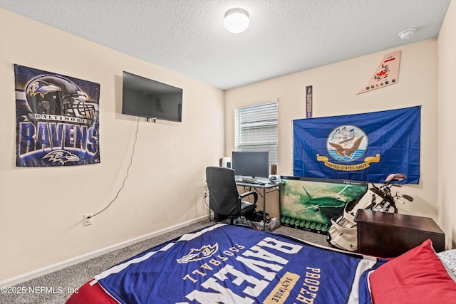 carpeted bedroom with a textured ceiling