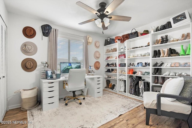 office area with ceiling fan and hardwood / wood-style flooring