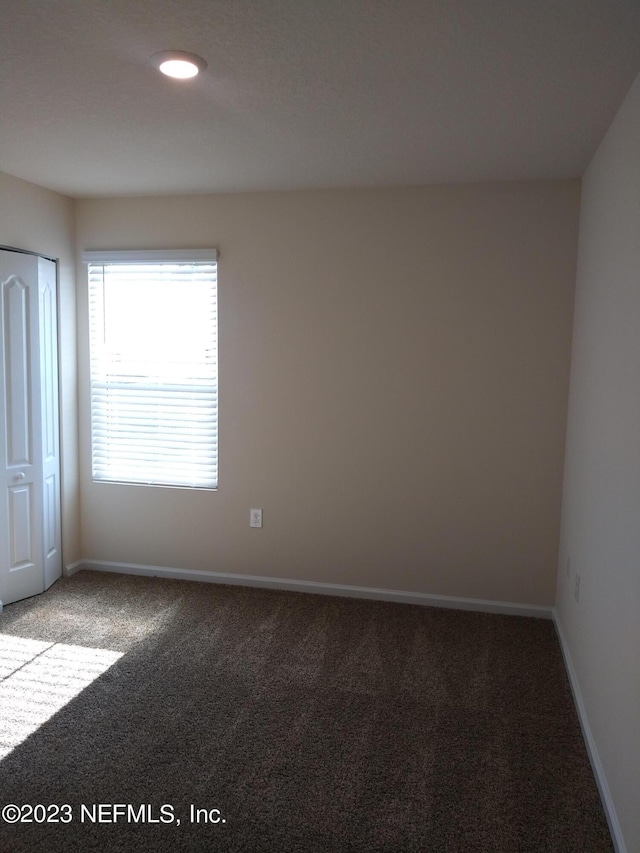 empty room with carpet floors