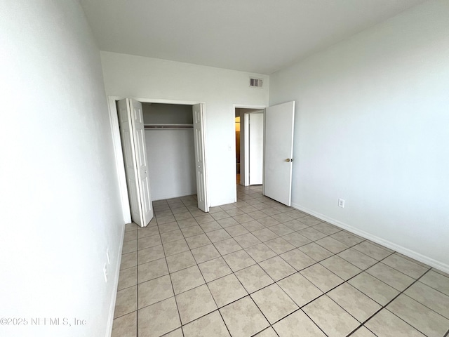 unfurnished bedroom featuring a closet