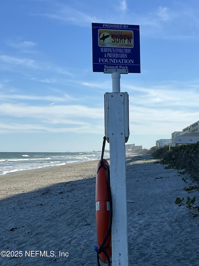 exterior details featuring a beach view