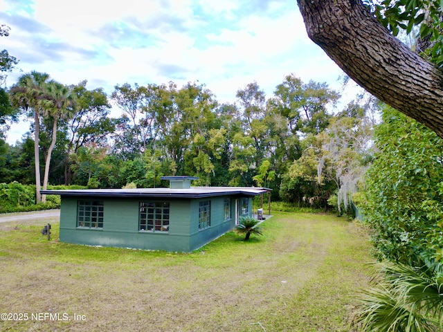 exterior space with a lawn