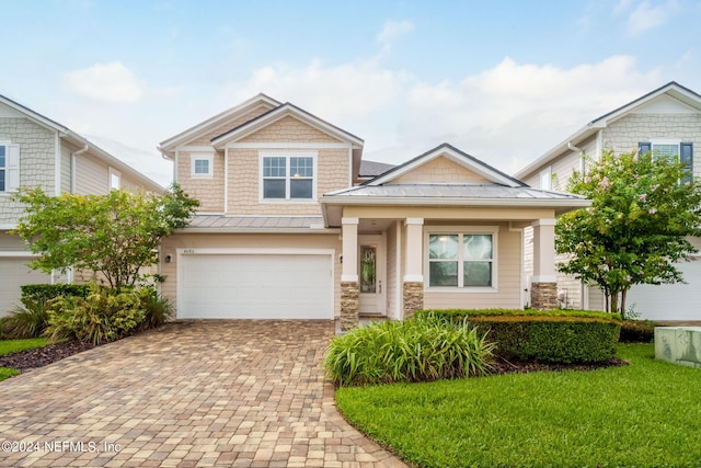 craftsman-style home featuring a garage