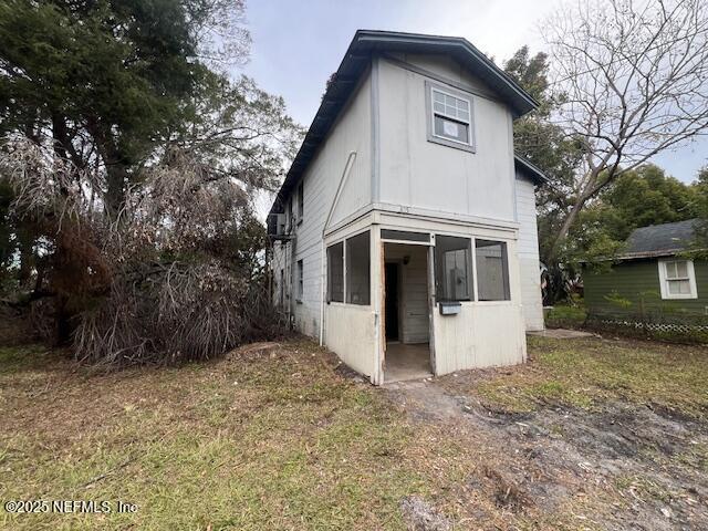 exterior space with a yard