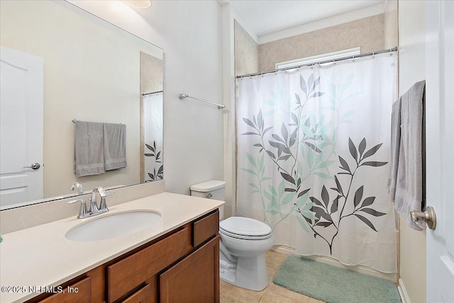 bathroom featuring tile patterned flooring, toilet, vanity, and curtained shower