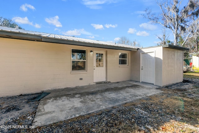 back of house featuring a patio