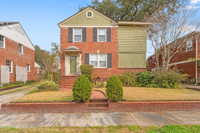 view of front property featuring a front yard