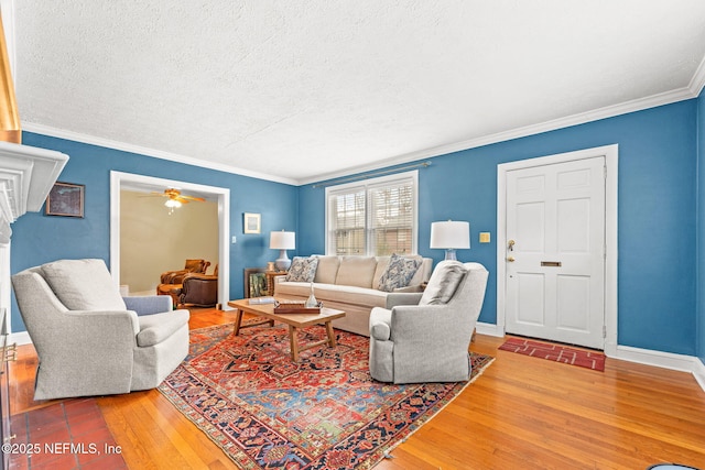 living room featuring crown molding, a textured ceiling, and hardwood / wood-style flooring