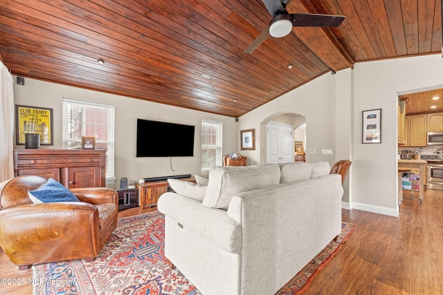 living room featuring vaulted ceiling with beams, hardwood / wood-style floors, wood ceiling, and ceiling fan