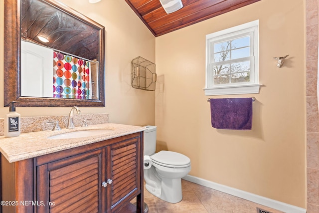 bathroom with lofted ceiling, tile patterned flooring, vanity, wooden ceiling, and toilet