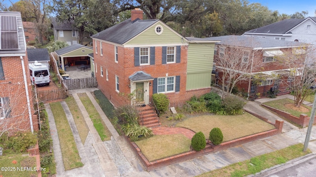 view of front of house featuring a front lawn