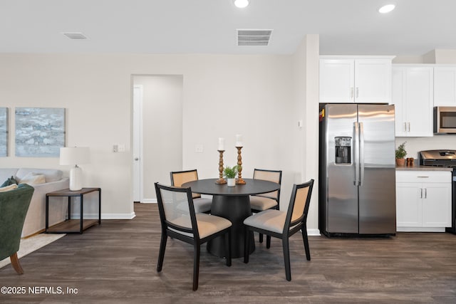 dining room featuring dark hardwood / wood-style floors