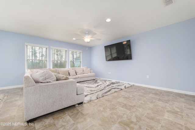 living room featuring ceiling fan