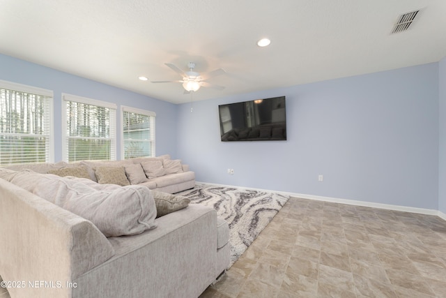 living room featuring ceiling fan