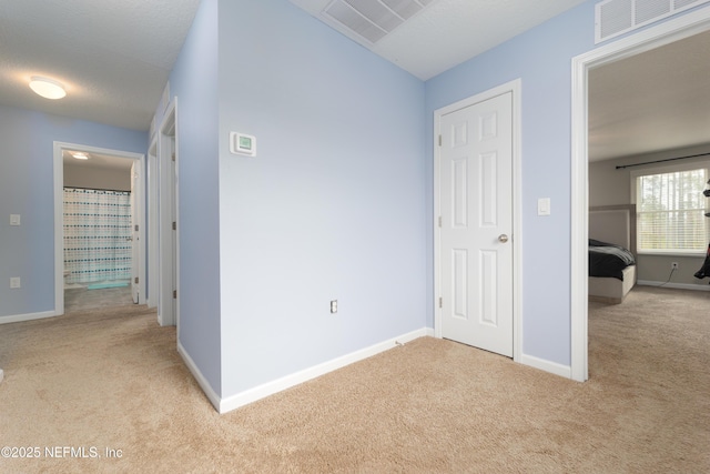 interior space with light colored carpet