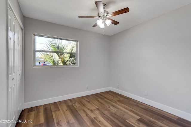 unfurnished room featuring ceiling fan and wood-type flooring