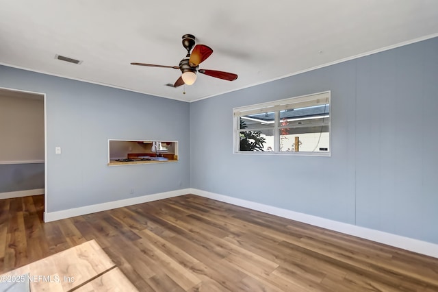 unfurnished room with ceiling fan and hardwood / wood-style floors