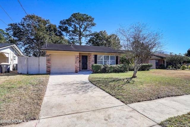 single story home featuring a garage and a front yard