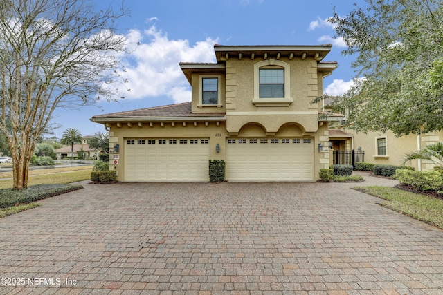 view of front of home with a garage