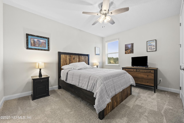 bedroom with ceiling fan and carpet flooring