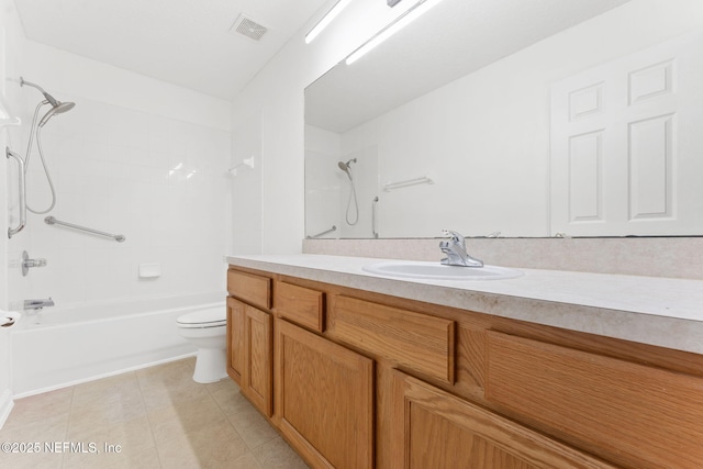 full bath featuring visible vents, toilet, washtub / shower combination, vanity, and tile patterned flooring