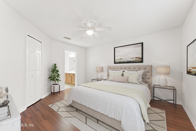 bedroom with ceiling fan, a closet, baseboards, and dark wood-type flooring