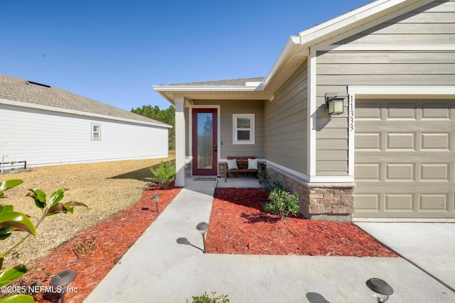 entrance to property with a garage