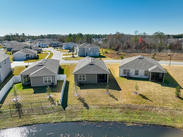 drone / aerial view with a water view