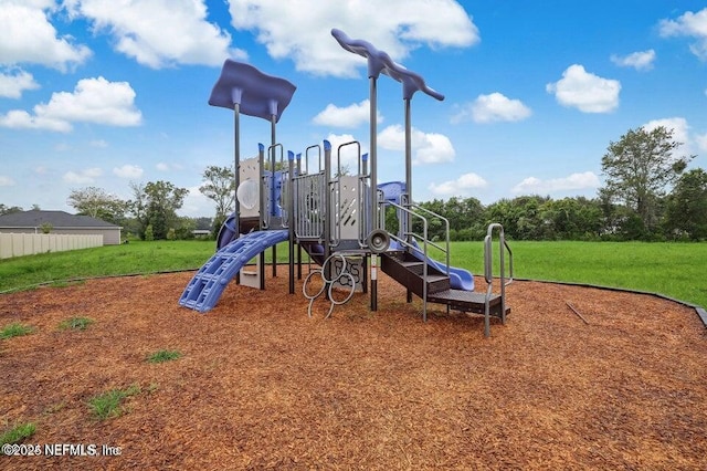 view of playground with a yard