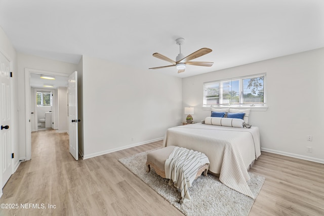 bedroom with ceiling fan and light hardwood / wood-style floors