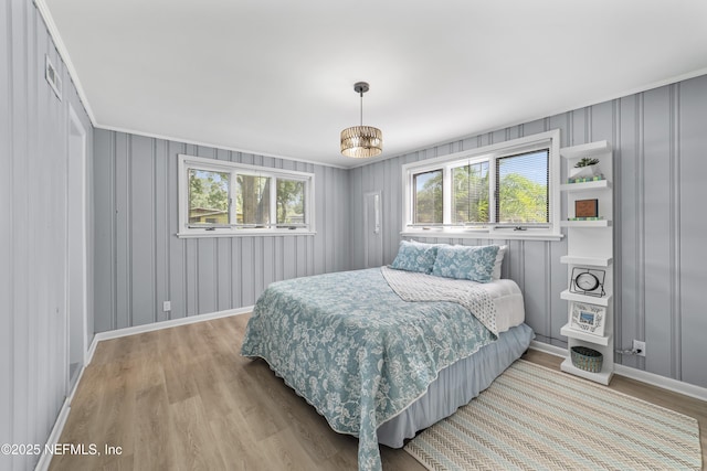 bedroom with light hardwood / wood-style flooring