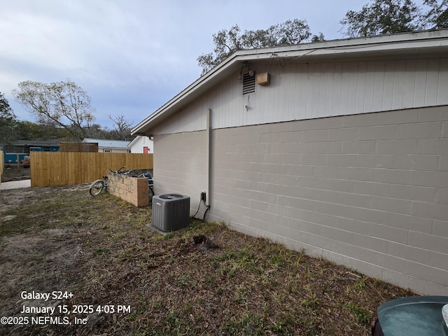 view of property exterior featuring central AC unit