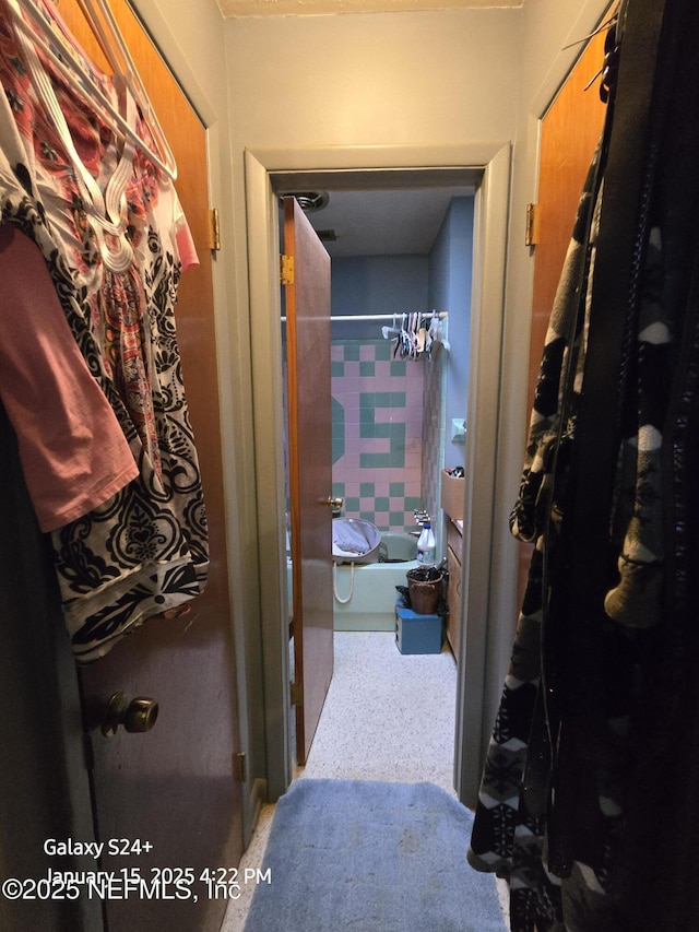 interior space featuring shower / tub combo with curtain