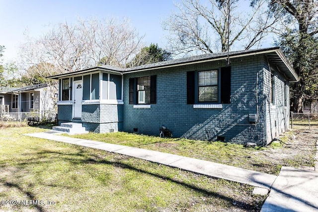 view of front of home with a front yard