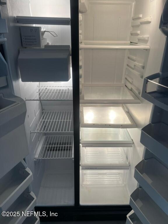 interior details with refrigerator