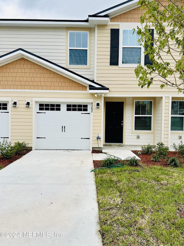 view of front of house with a garage