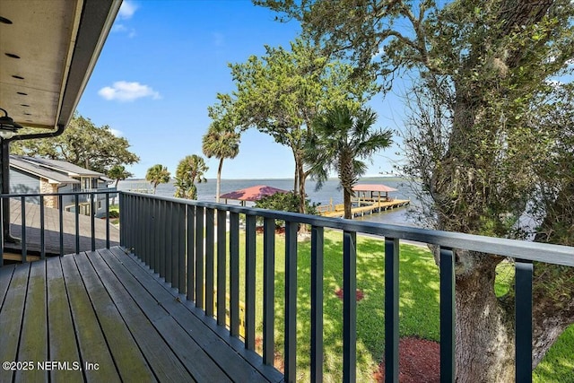 wooden terrace with a water view