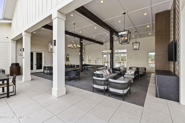 exterior space featuring french doors and outdoor lounge area