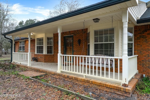 exterior space featuring covered porch