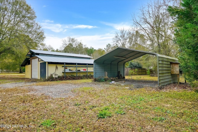 view of outbuilding featuring a carport