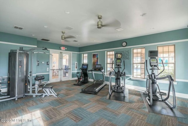 workout area with ceiling fan, dark carpet, and french doors