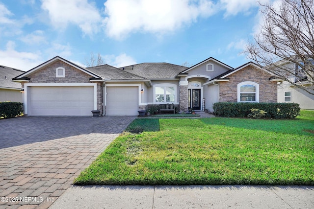 single story home with a front lawn and a garage