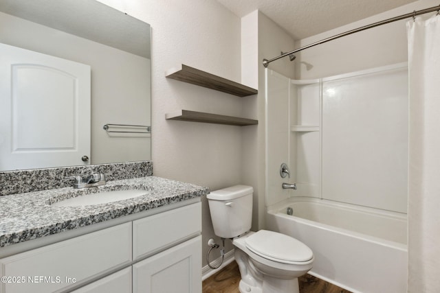 195 River Rdg Pl, Welaka, FL 32193 - full bathroom with vanity, shower / tub combo with curtain, a textured ceiling, and toilet
