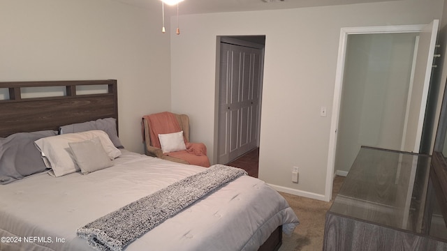 carpeted bedroom with a closet